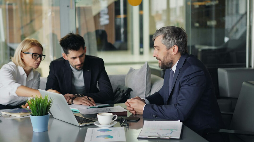 business people negotiating deal